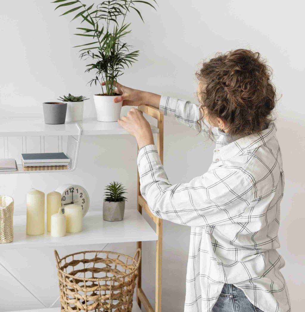 medium-shot-woman-arranging-plant